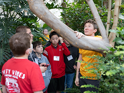 Student leading STEM Cubs event.