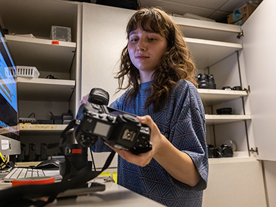 Student working with camera.