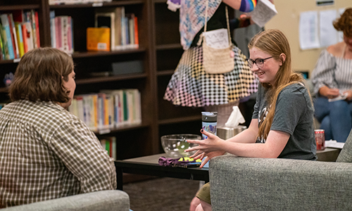 Students talking in Student Resource Center.