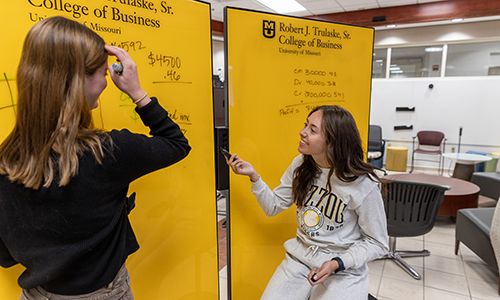 Students at business event.